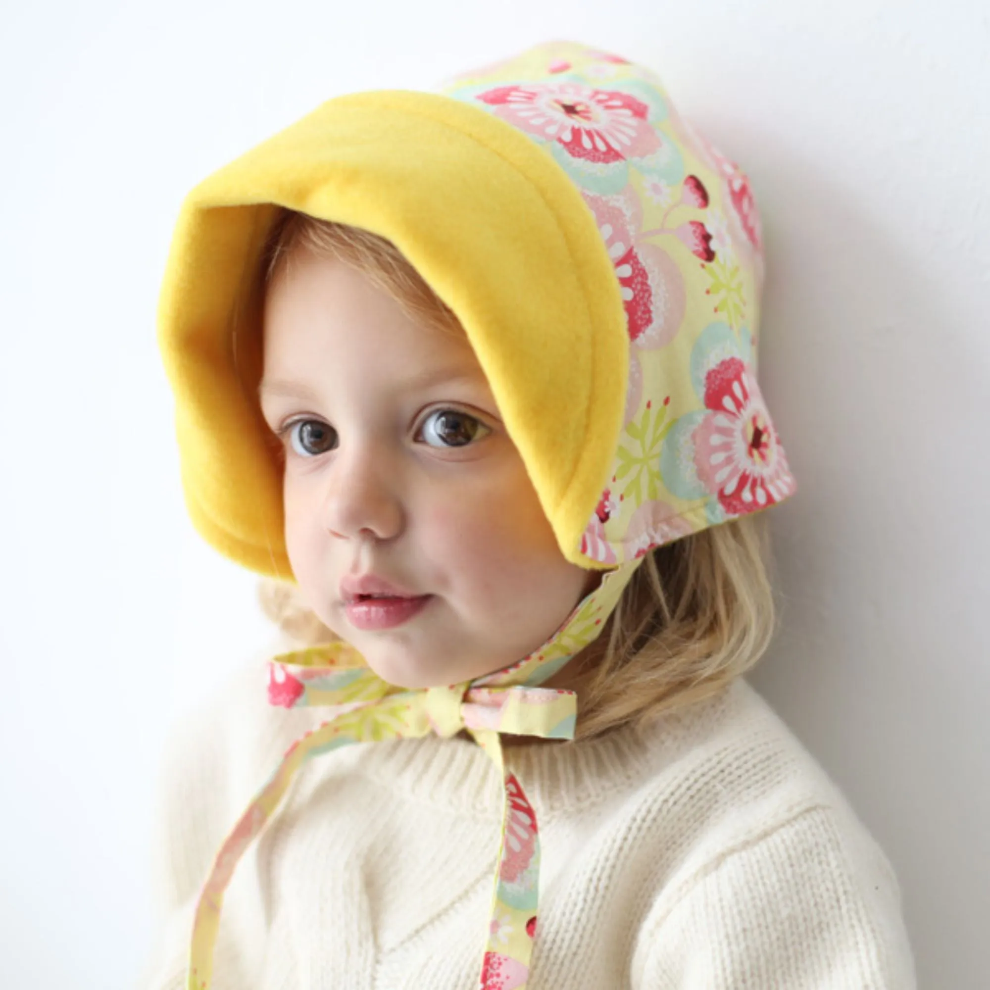 Innobaby Baby Fleece Winter Bonnet – Soft, Warm, and Adjustable Cold-Weather Hat (Ages 6-18M)